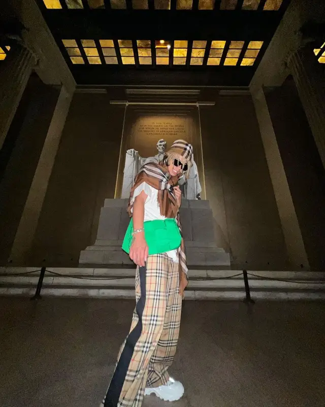 Iann Dior outfit in Bottega Veneta, Louis Vuitton, and Burberry, 2022