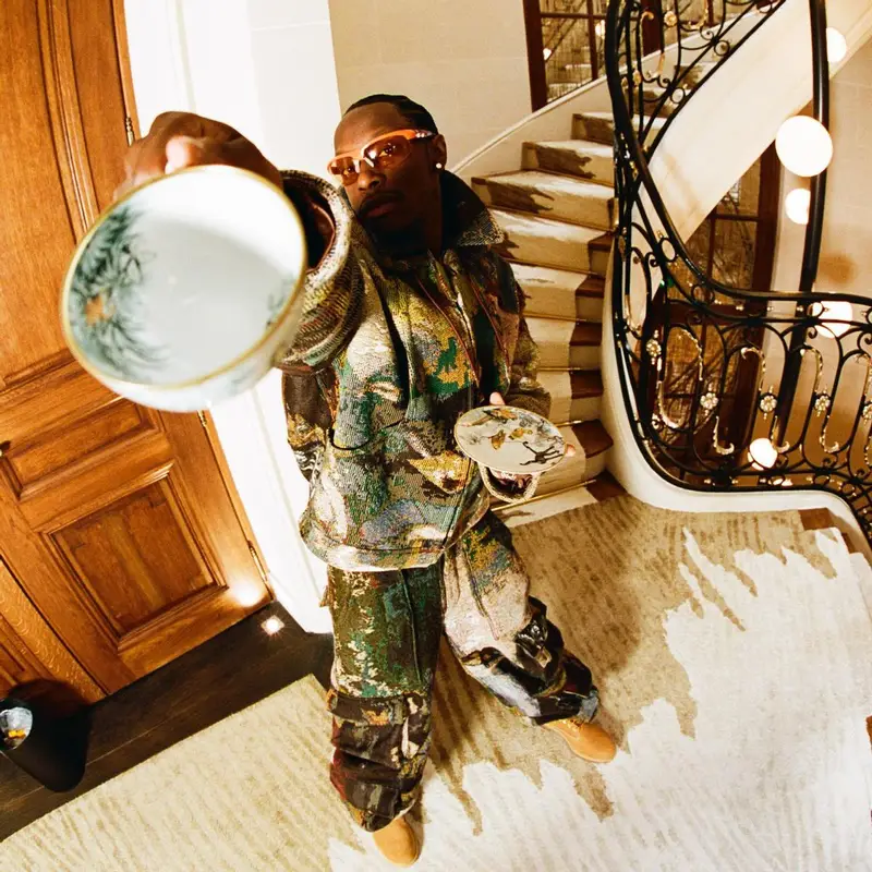 Bloody Osiris outfit in Louis Vuitton, Timberland, and Tom Ford, 2022