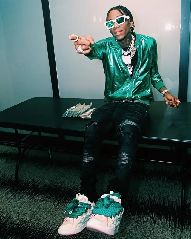 Soulja Boy outfit in Amiri, Burberry, and Louis Vuitton, 2022