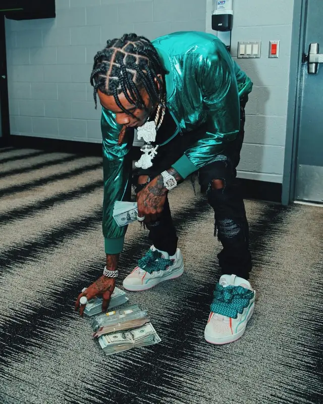 Soulja Boy outfit in Amiri, Burberry, and Louis Vuitton, 2022