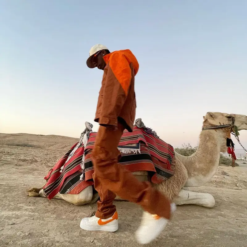 Bloody Osiris outfit in Louis Vuitton, Supreme, and New Era, 2022