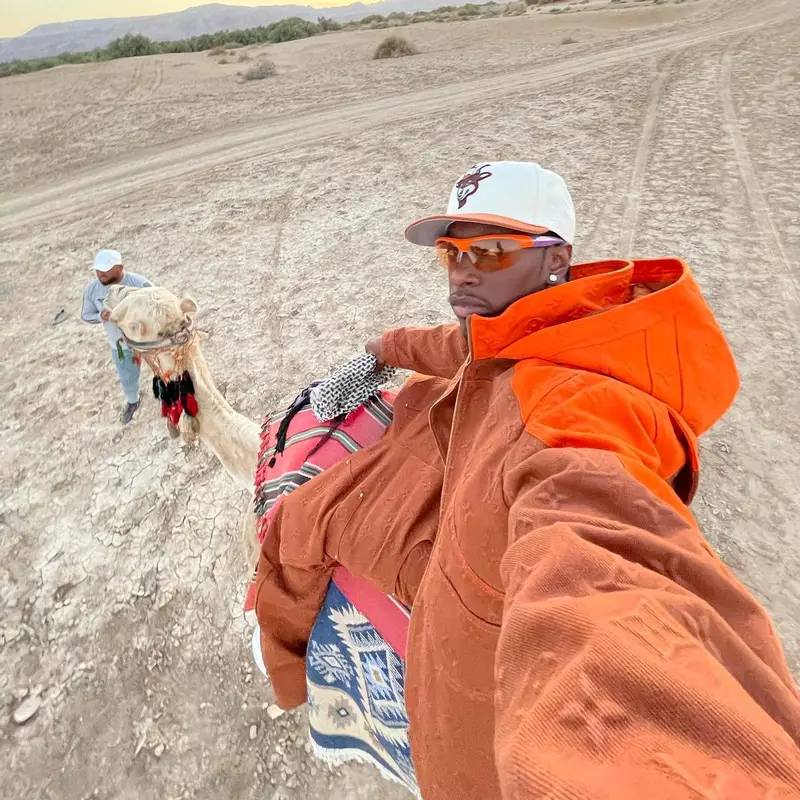 Bloody Osiris outfit in Louis Vuitton, Supreme, and New Era, 2022
