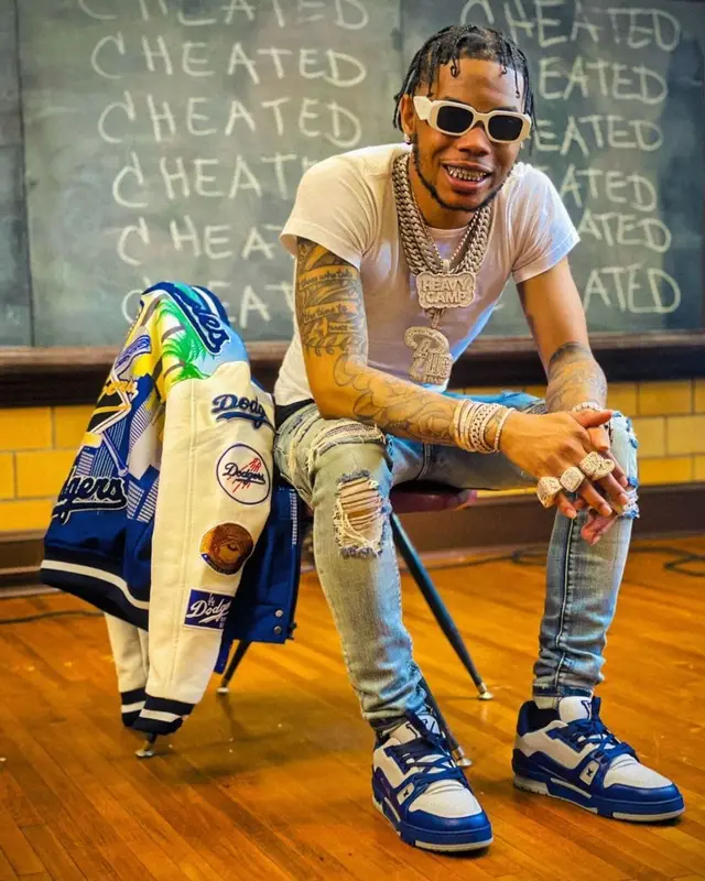 Lil Migo outfit in Pro Standard, Prada, and Los Angeles Dodgers, 2022