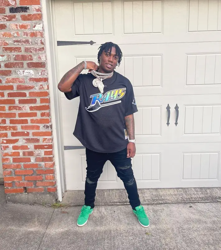 Fredo Bang outfit in Mitchell & Ness, Amiri, and Nike, 2022