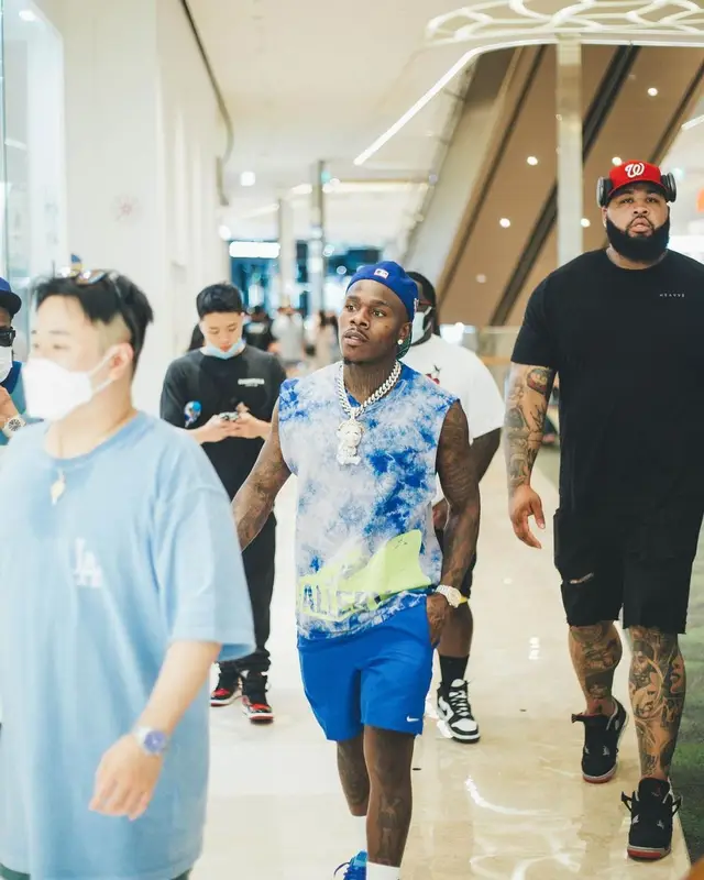 DaBaby outfit in Gallery Dept., New Era, and Celine, 2022