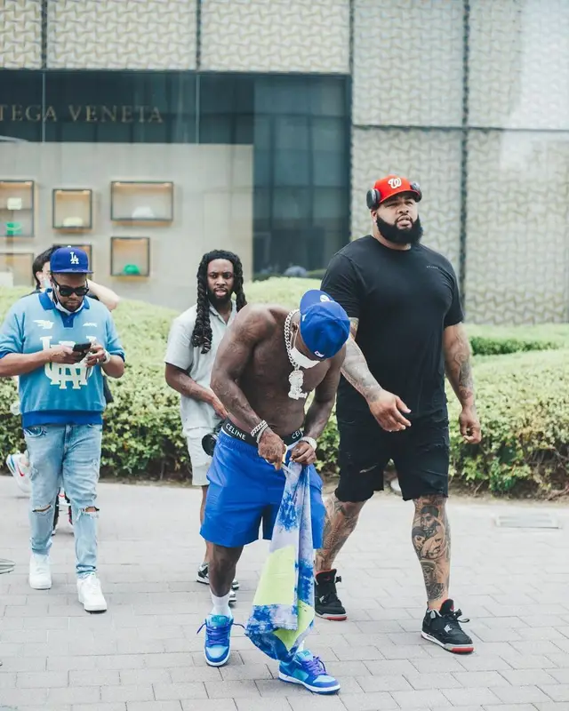 DaBaby outfit in Gallery Dept., New Era, and Celine, 2022