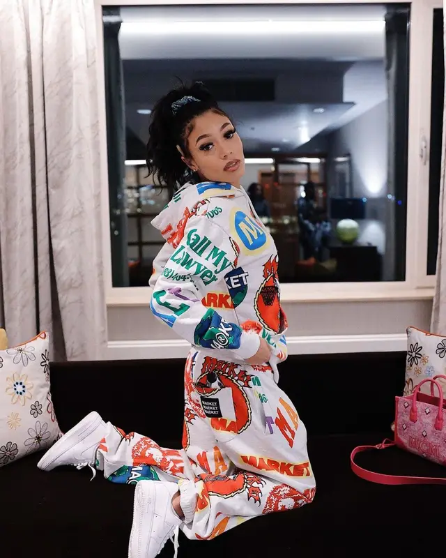 Coi Leray outfit in Market, Nike, and MCM, 2022