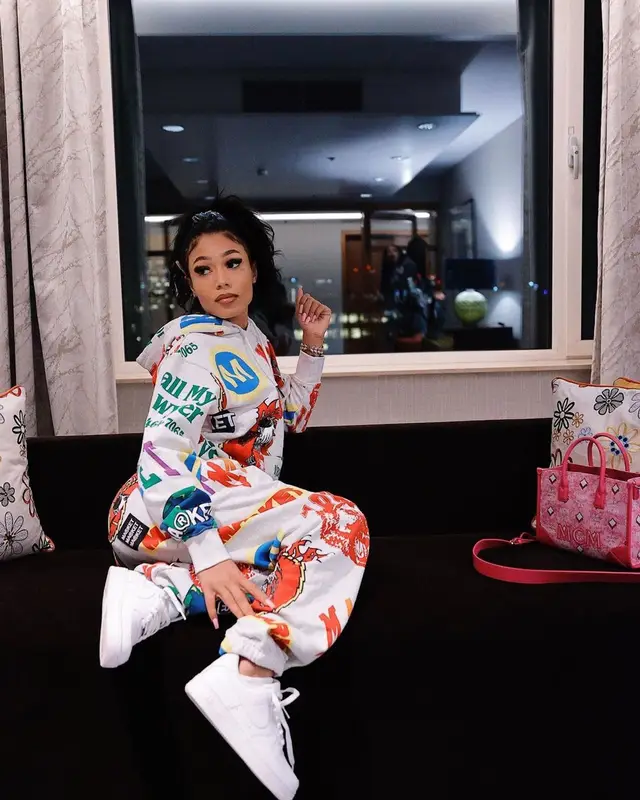 Coi Leray outfit in Market, Nike, and MCM, 2022