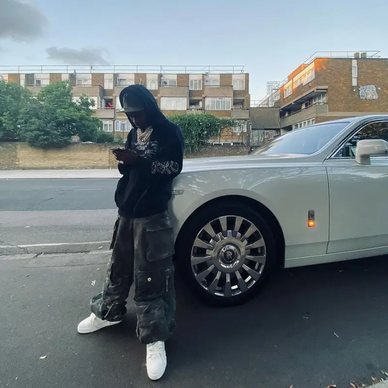Roddy Ricch outfit in Rhude, The Attico, and New Era, 2022