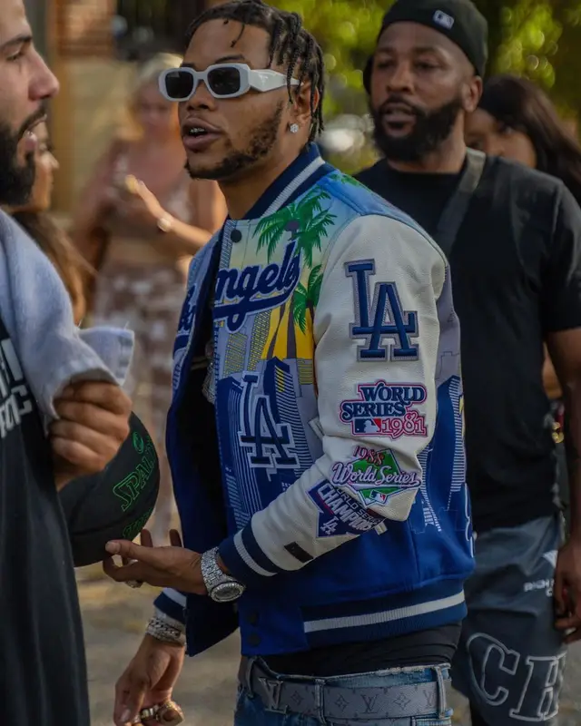 Lil Migo outfit in Pro Standard, Prada, and Los Angeles Dodgers, 2022