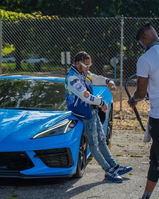 Lil Migo outfit in Pro Standard, Prada, and Los Angeles Dodgers, 2022