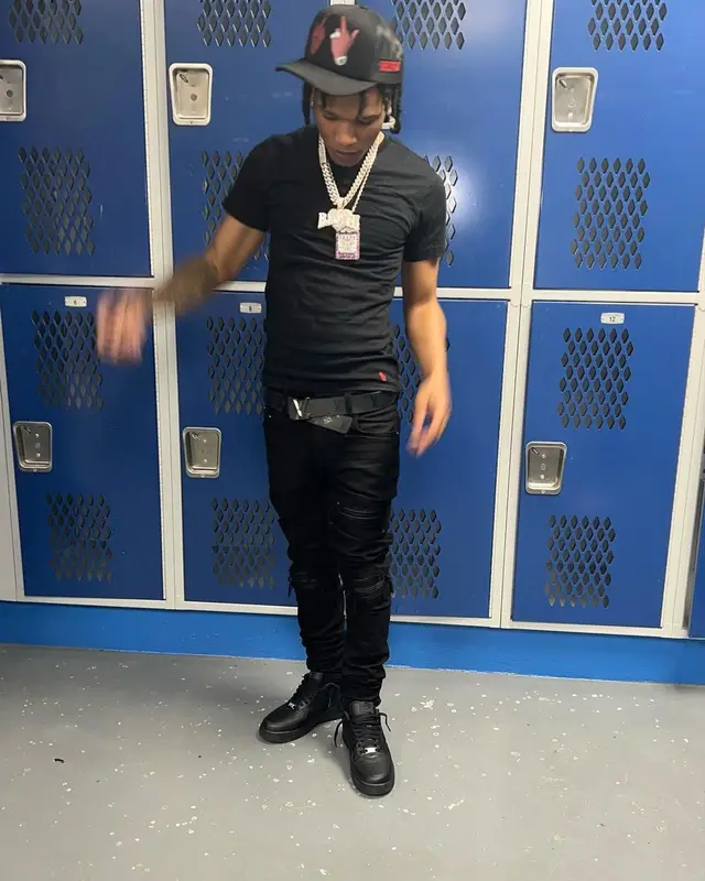 B Lovee outfit in Polo Ralph Lauren, Amiri, and Louis Vuitton, 2022