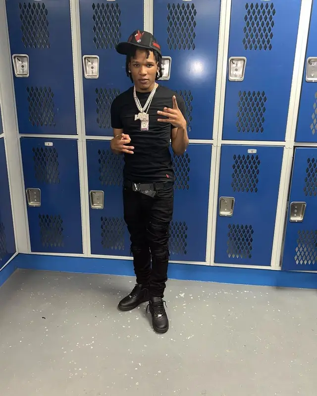B Lovee outfit in Polo Ralph Lauren, Amiri, and Louis Vuitton, 2022