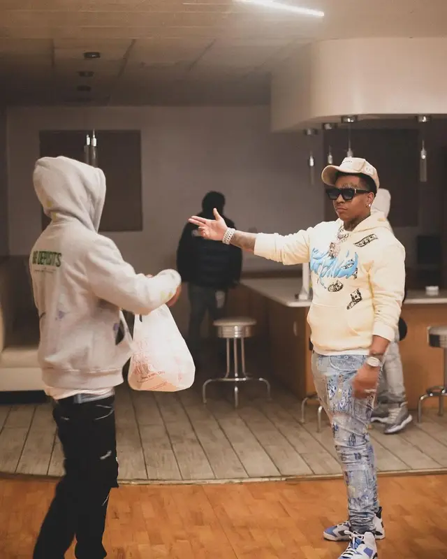Lil Gotit outfit in Selfpaid, Purple Brand, and Jordan, 2022