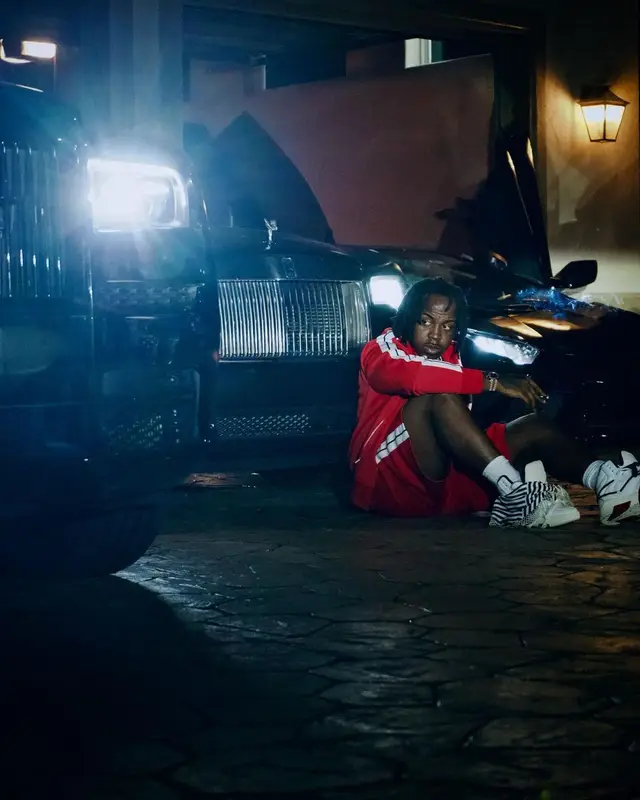 EST Gee outfit in Palm Angels and Saint Laurent, 2022