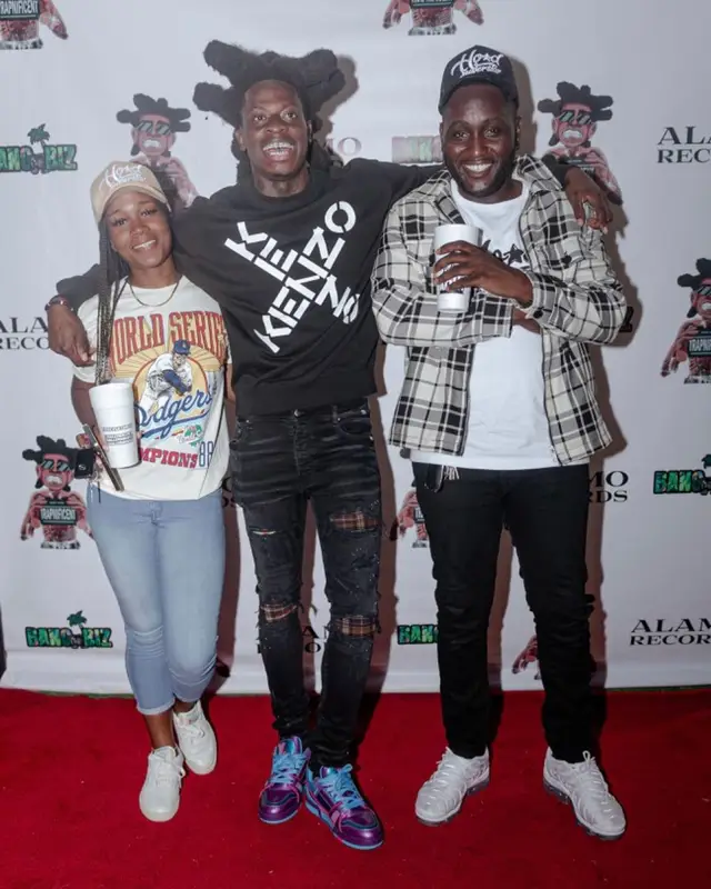 Trapland Pat outfit in Kenzo, Amiri, and Louis Vuitton, 2022