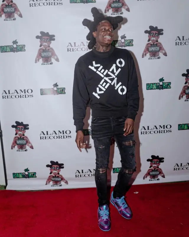Trapland Pat outfit in Kenzo, Amiri, and Louis Vuitton, 2022