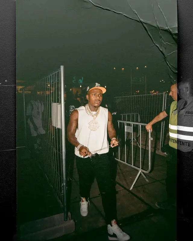 DaBaby outfit in Amiri, Nike, and New Era, 2022