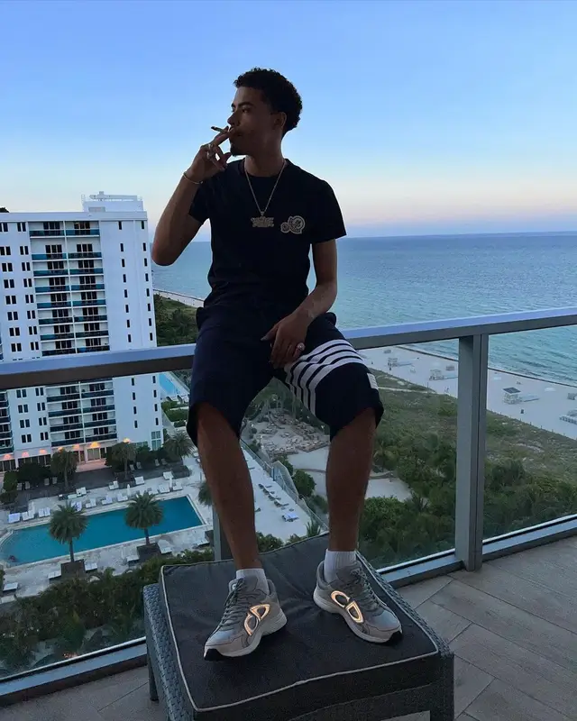 Jay Critch outfit in Moncler, Thom Browne, and Dior, 2022