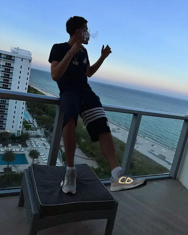 Jay Critch outfit in Moncler, Thom Browne, and Dior, 2022