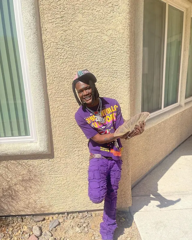 2KBABY outfit in Awful Lot of Cough Syrup, Louis Vuitton, and Von Dutch, 2022