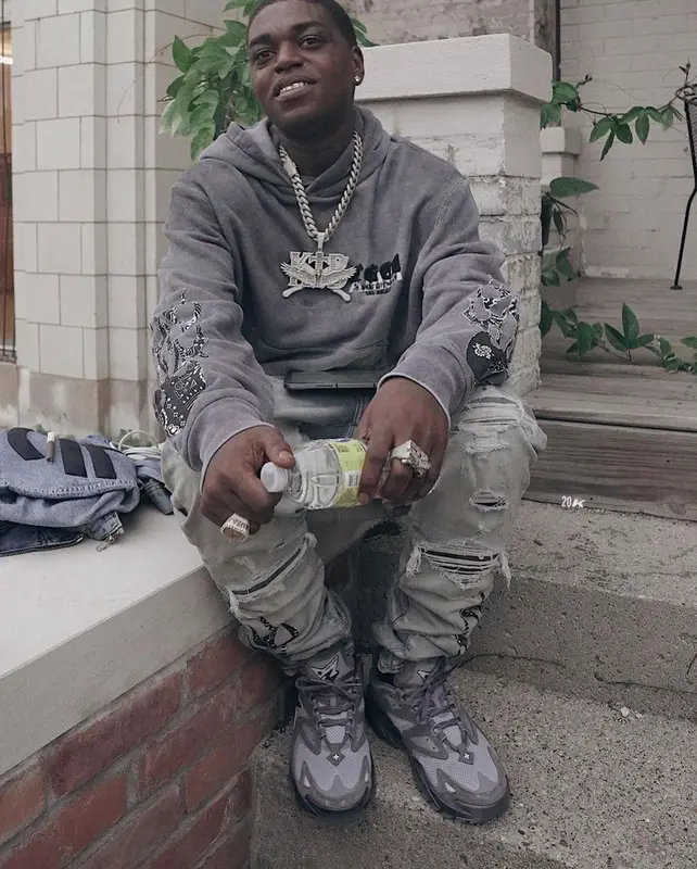Kodak Black outfit in Amiri, Louis Vuitton, and The Great City Workshop, 2022