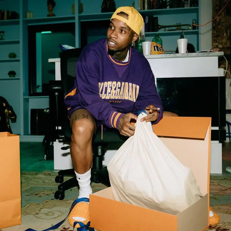 Tory Lanez outfit in Dolce & Gabbana, Rhude, and Nike, 2022