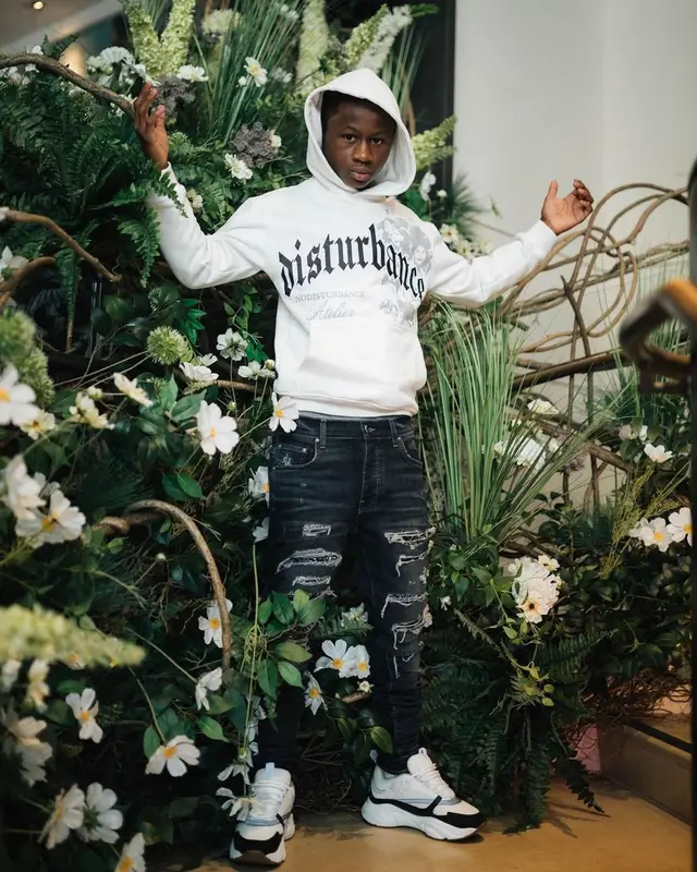 Bouba Savage outfit in Amiri, Dior, and Nodisturbance, 2022
