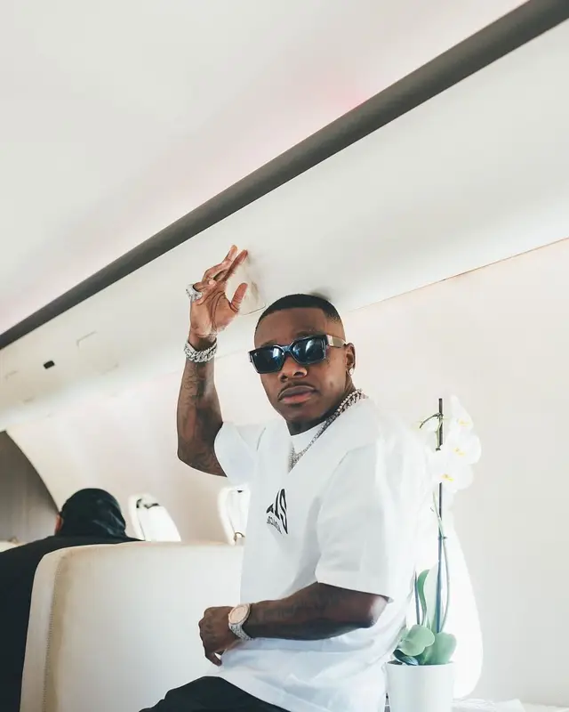 DaBaby outfit in Balenciaga and Louis Vuitton, 2022