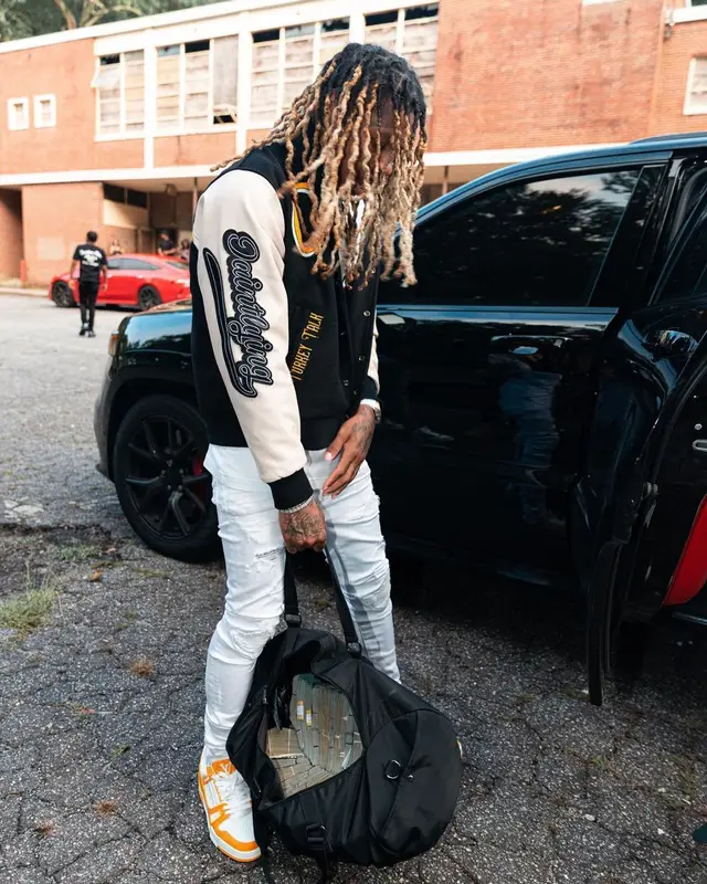 Lil Durk outfit in Dior, Amiri, and Travis Scott Merch, 2022