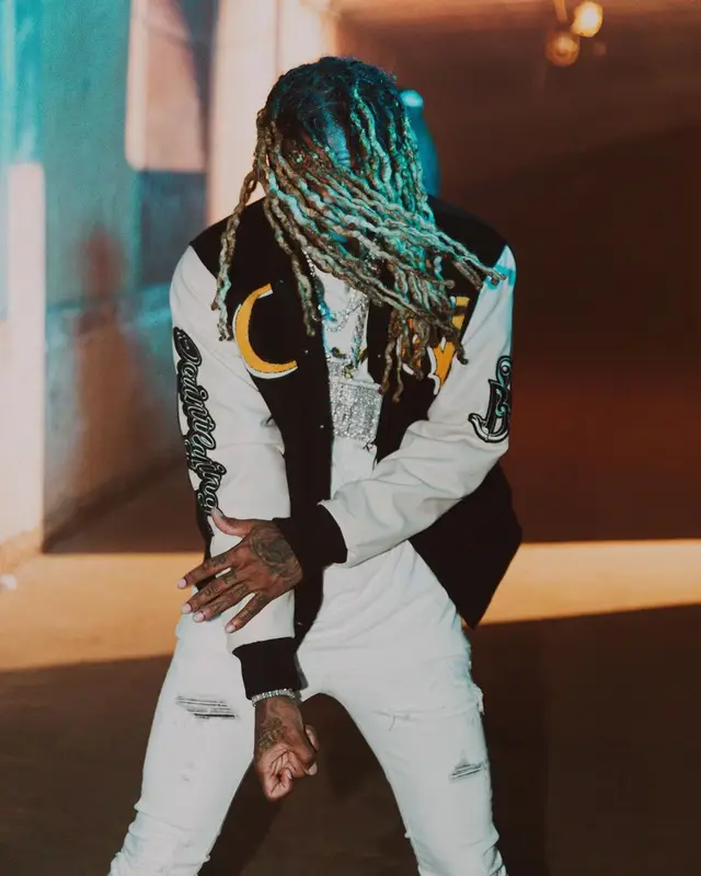 Lil Durk outfit in Dior, Amiri, and Travis Scott Merch, 2022