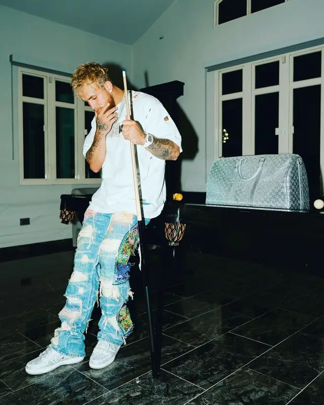 Jake Paul outfit in Balenciaga, Who Decides War, and Nike, 2022