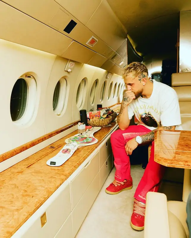 Jake Paul outfit in Readymade, Gallery Dept., and Denim Tears, 2022