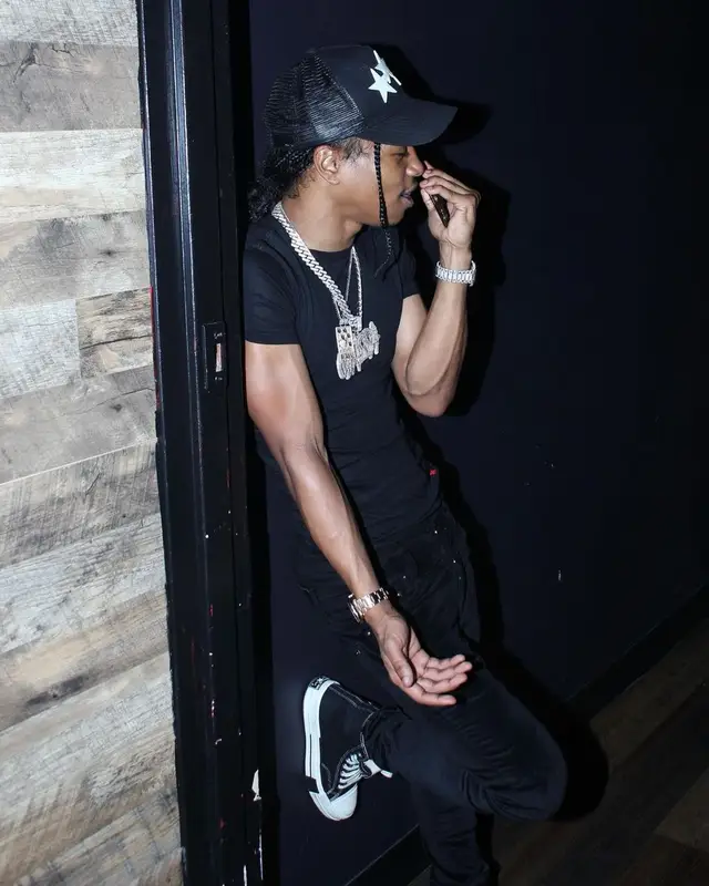 Pressa outfit in Polo Ralph Lauren, Converse, and Amiri, 2022