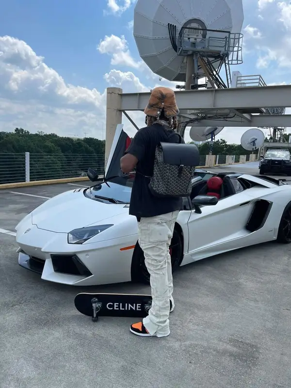 Lil Gnar outfit in Vintage, Goyard, and Marni, 2022
