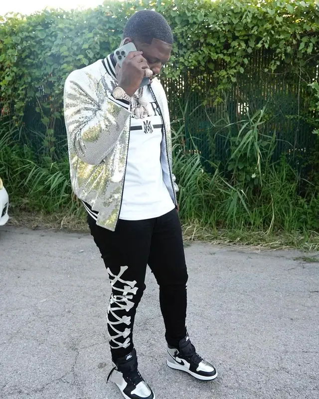Lil Zay Osama outfit in Celine, Amiri, and Nike, 2022