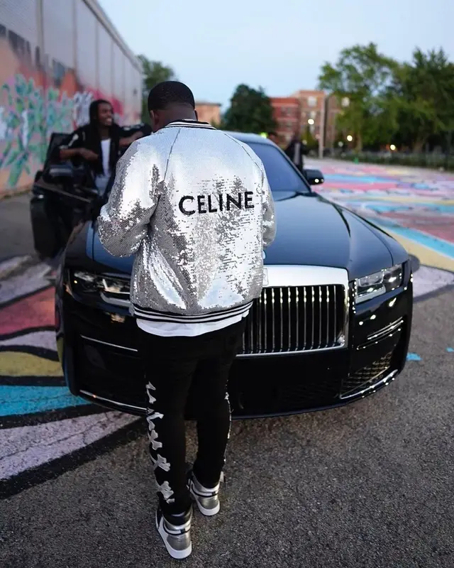 Lil Zay Osama outfit in Celine, Amiri, and Nike, 2022