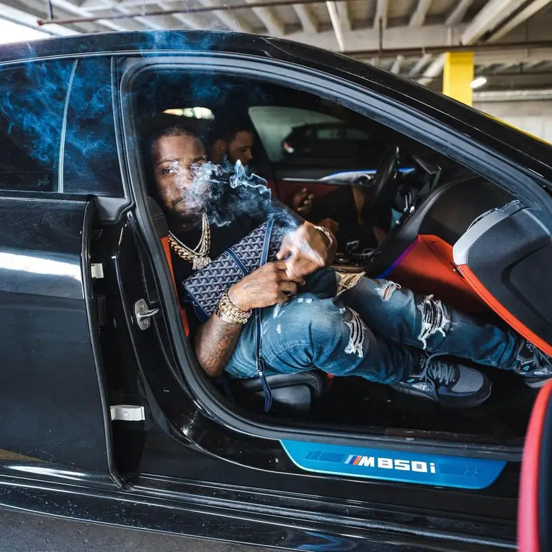 Peezy outfit in Amiri, Louis Vuitton, and Goyard, 2022