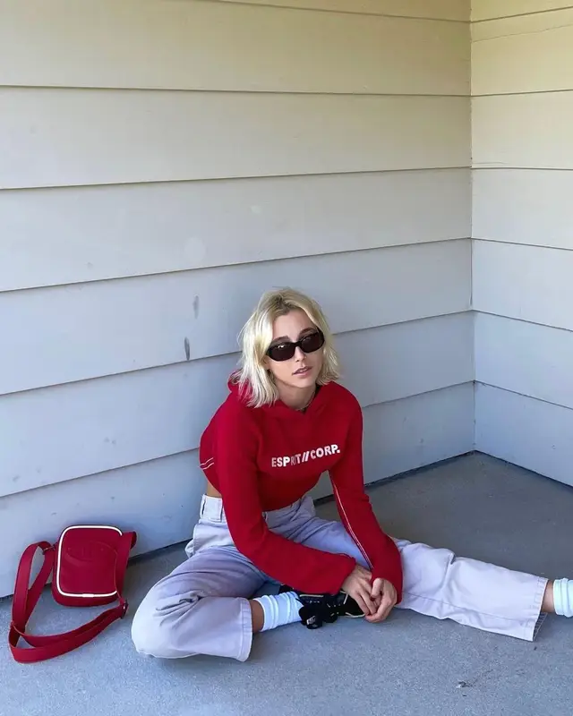 Emma Chamberlain outfit in Dickies, Diesel, and Tol Eyewear, 2022