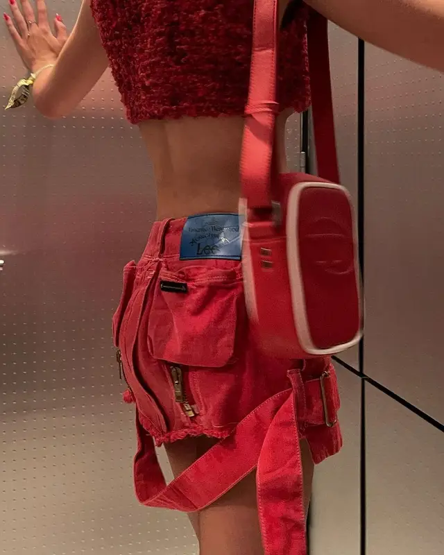 Emma Chamberlain outfit in Jeffrey Campbell, Diesel, and Lexxola, 2022