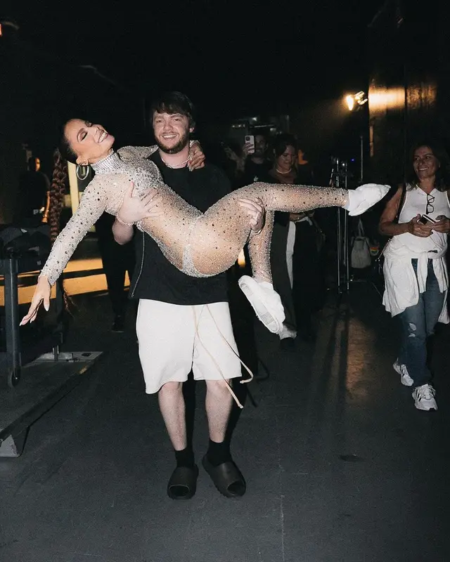 Murda Beatz outfit in Hanes, Fear of God, and Yeezy, 2022