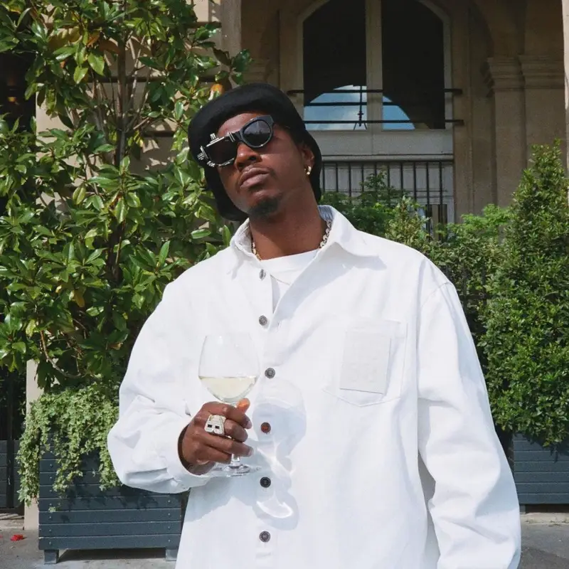Joey Badass outfit in Raf Simons, Denim Tears, and Kuboraum, 2022