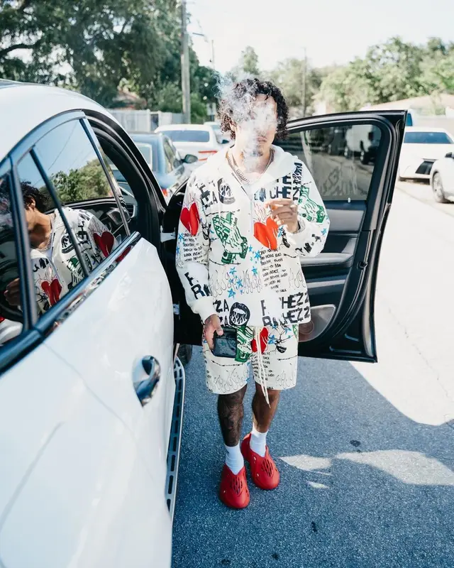 King Cid outfit in Ricchezza Forever, Yeezy, and Gucci, 2022