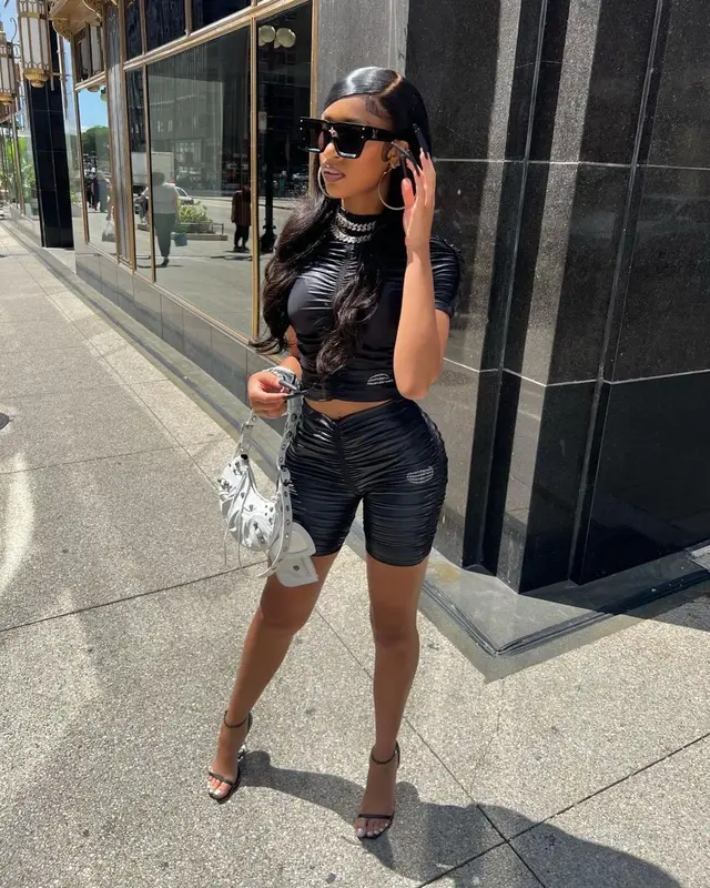 Lakeyah outfit in Alexander Wang, Balenciaga, and Louis Vuitton, 2022