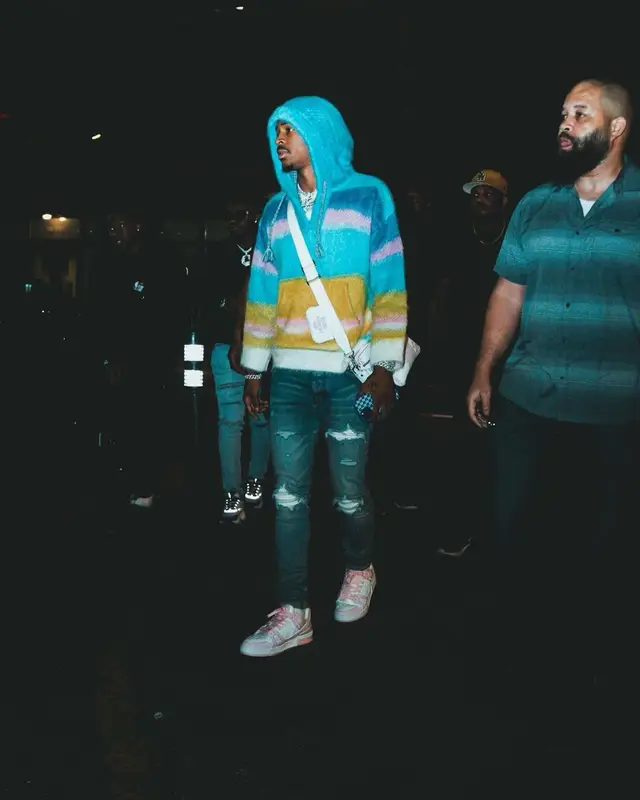 Ja Morant outfit in Celine, Louis Vuitton, and Dior, 2022