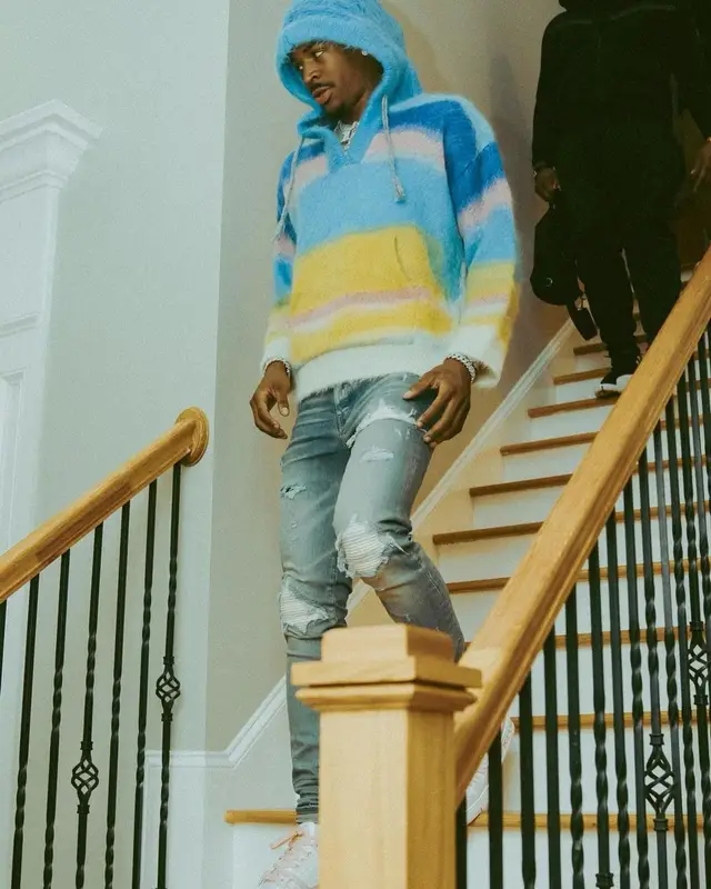 Ja Morant outfit in Celine, Louis Vuitton, and Dior, 2022
