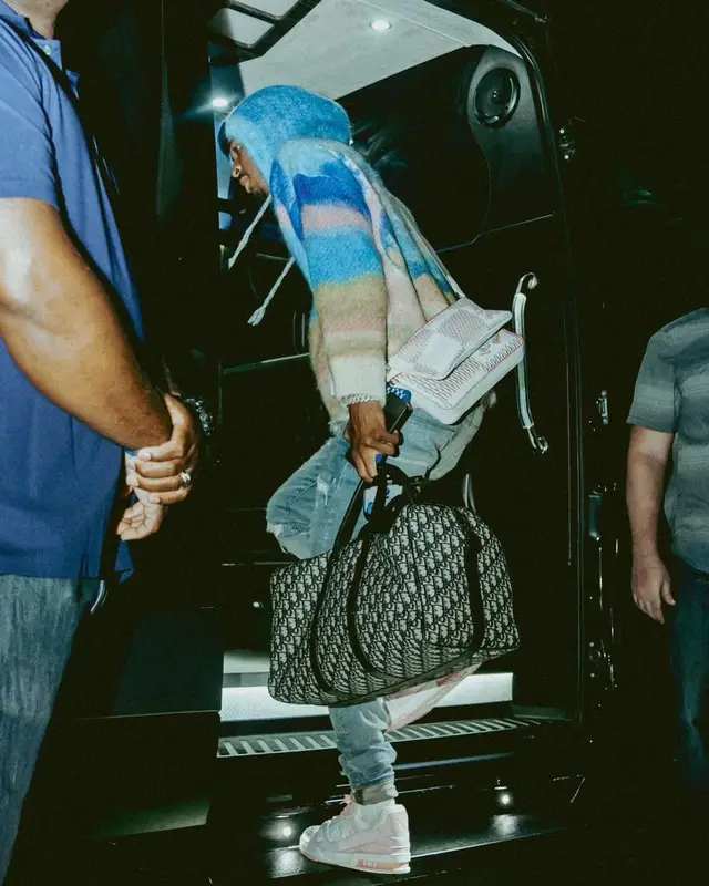 Ja Morant outfit in Celine, Louis Vuitton, and Dior, 2022