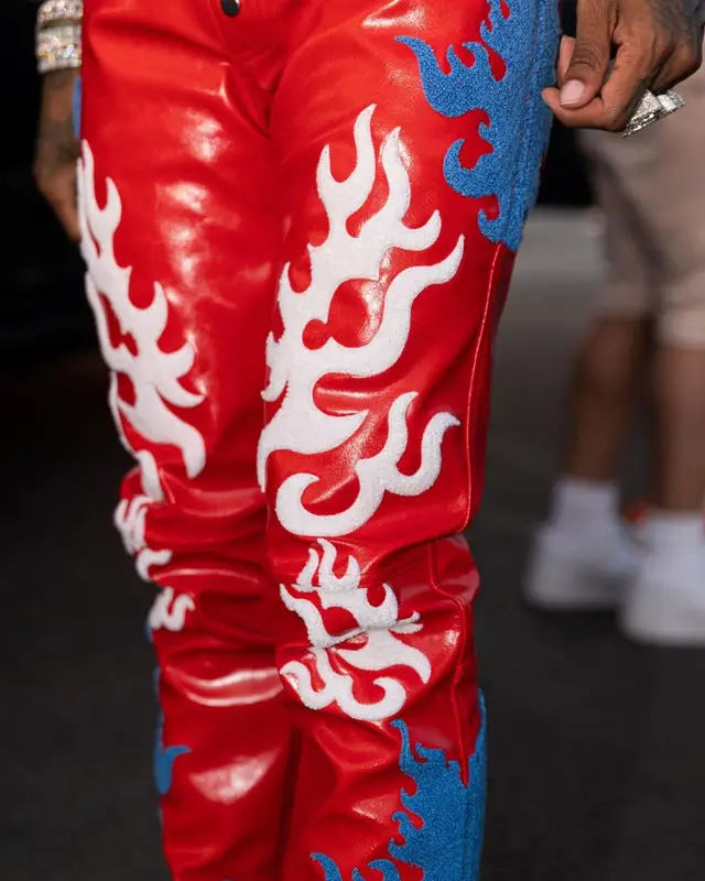 Lil Durk outfit in Louis Vuitton, RoyGBiv, and Nike, 2022