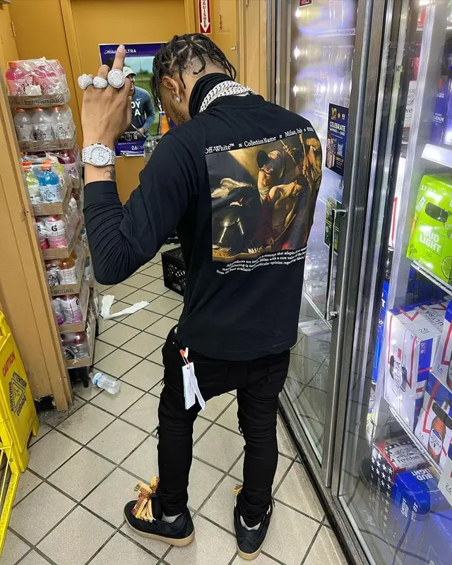 Lil Migo outfit in Off-White, Louis Vuitton, and Prada, 2022