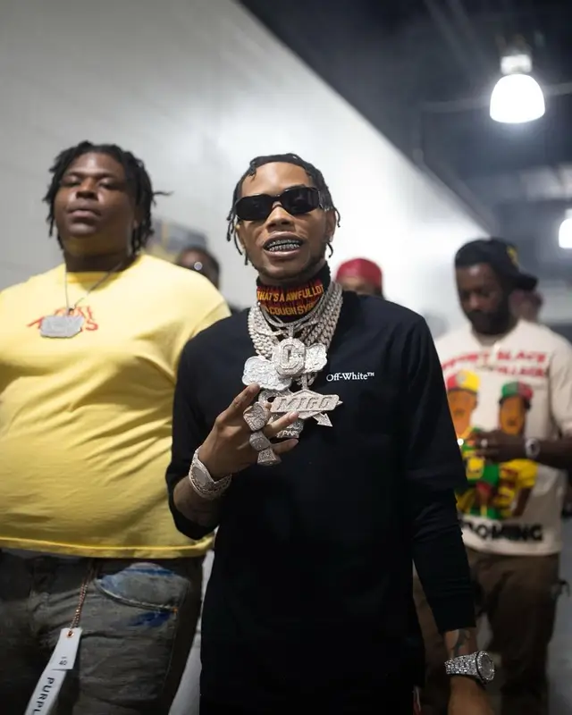 Lil Migo outfit in Off-White, Louis Vuitton, and Prada, 2022